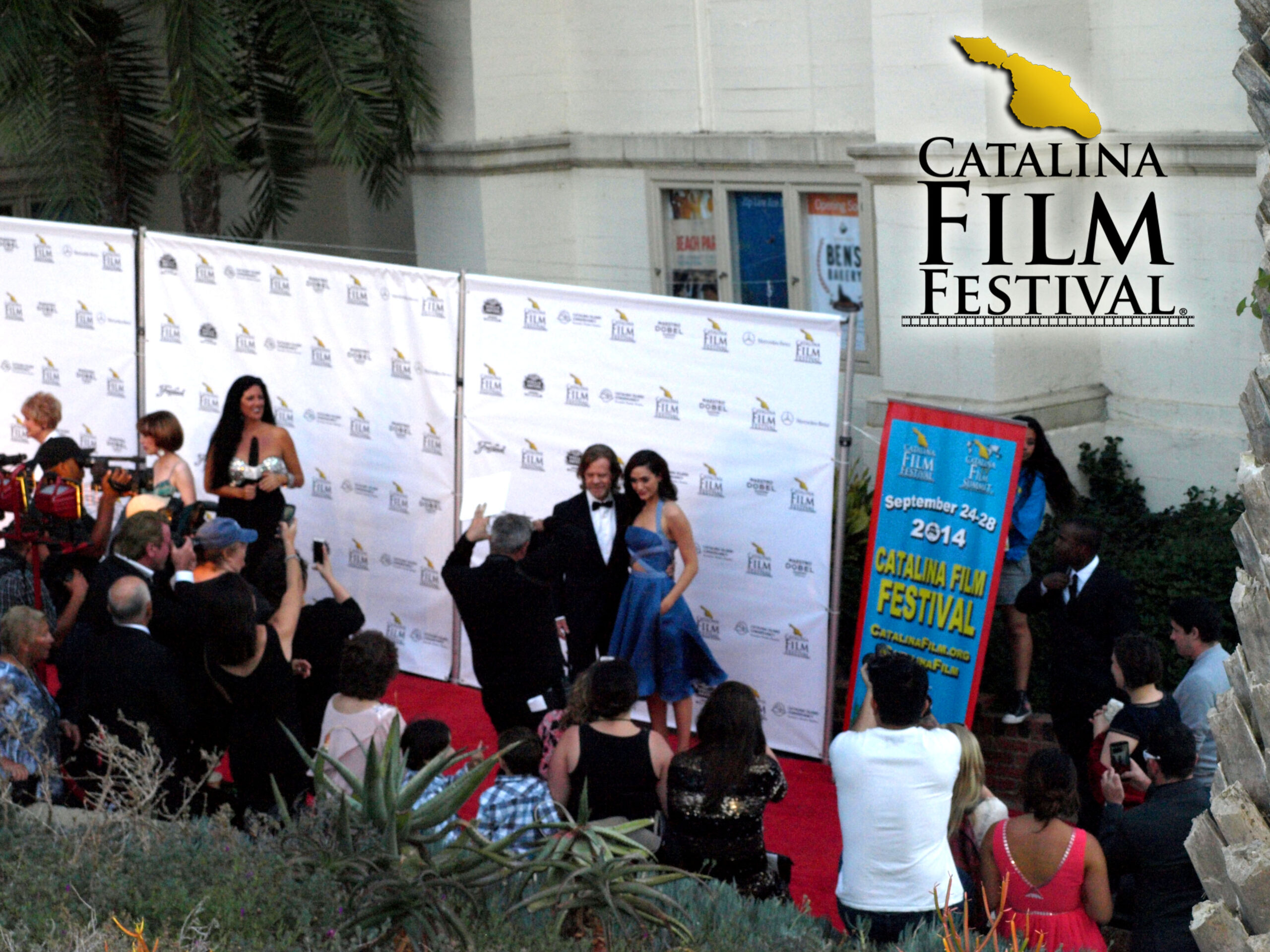 Catalina Film Festival red carpet with guests posing at the step-and-repeat
