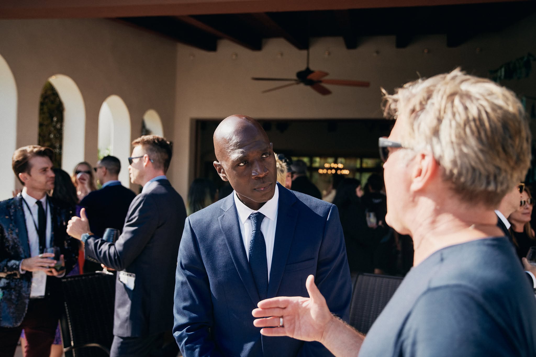 Guests networking outdoors during the festival