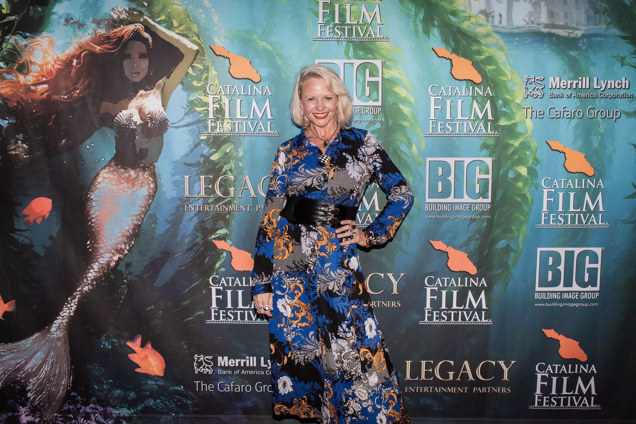 Festival guest posing on the Catalina Film Festival red carpet